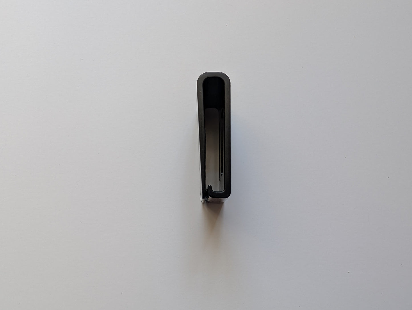 Close up of the plastic clip that shows how it attaches to a belt